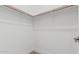 Walk-in closet with built-in shelving at 862 W Rawhide Ave, Gilbert, AZ 85233
