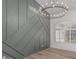 Dining room featuring an elegant chandelier and a unique textured wall at 862 W Rawhide Ave, Gilbert, AZ 85233