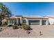 Charming single-story home with desert landscaping, a 3-car garage, and a neutral color palette at 862 W Rawhide Ave, Gilbert, AZ 85233