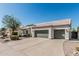 Well-maintained single-story home with three-car garage, desert landscaping, and a tile roof at 862 W Rawhide Ave, Gilbert, AZ 85233