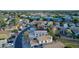 Neighborhood aerial view of houses, streets and mature trees at 921 S Val Vista Dr # 135, Mesa, AZ 85204