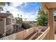 Relaxing balcony overlooking the common pool with beautiful, sunny skies at 921 S Val Vista Dr # 135, Mesa, AZ 85204