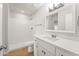 Modern bathroom boasts white cabinetry, neutral walls, and a walk-in shower at 921 S Val Vista Dr # 135, Mesa, AZ 85204