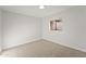Bedroom featuring neutral carpet and a window for natural light at 921 S Val Vista Dr # 135, Mesa, AZ 85204