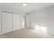 Bedroom featuring neutral carpet and a closet at 921 S Val Vista Dr # 135, Mesa, AZ 85204