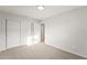 Bedroom featuring neutral carpet and a closet at 921 S Val Vista Dr # 135, Mesa, AZ 85204