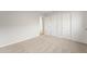 Bedroom with neutral carpet and multiple closets with sliding doors at 921 S Val Vista Dr # 135, Mesa, AZ 85204