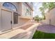 Home entrance features a modern door and rock landscaping for low maintenance at 921 S Val Vista Dr # 135, Mesa, AZ 85204