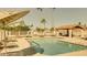 Inviting community pool with chairs for residents at 921 S Val Vista Dr # 135, Mesa, AZ 85204