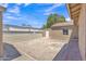 Backyard with partial dirt, block fence, storage shed and back of house at 101 W 8Th Pl, Mesa, AZ 85201