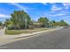 A well-manicured front yard and landscaping enhances this attractive corner lot property at 101 W 8Th Pl, Mesa, AZ 85201