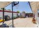 Backyard featuring a basketball hoop, shed, and a variety of tools and equipment at 1017 S San Jose Cir, Mesa, AZ 85202