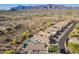Expansive aerial view showing the desert landscape and surrounding mountains at 10276 E Meandering Trail Ln, Gold Canyon, AZ 85118