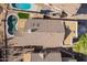 Aerial rooftop view with pool and desert landscape at 10276 E Meandering Trail Ln, Gold Canyon, AZ 85118