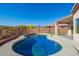 Backyard pool has a desert landscape, fencing and mountain views under a cloudless sky at 10276 E Meandering Trail Ln, Gold Canyon, AZ 85118