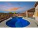 Backyard pool with mountain views and desert landscaping at 10276 E Meandering Trail Ln, Gold Canyon, AZ 85118