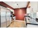 Kitchen featuring stainless steel appliances, and granite countertops at 10921 W Santa Fe Dr, Sun City, AZ 85351