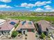 Community with solar panels, manicured lawns, and beautiful mountain views in a Primary-planned golf community at 12027 S 183Rd Dr, Goodyear, AZ 85338