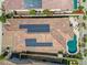 Stunning aerial view of a private backyard with solar panels, swimming pool, and meticulously landscaped patio at 12027 S 183Rd Dr, Goodyear, AZ 85338