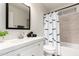 Contemporary bathroom with modern finishes, vanity, tile details, and bright lighting at 1220 S Wagon Wheel Dr, Chandler, AZ 85286