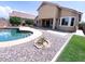 The house's backyard with pool at 1248 W Deoni Trl, San Tan Valley, AZ 85143