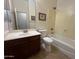 Bathroom with a bathtub/shower combination, vanity, and neutral color scheme at 1248 W Deoni Trl, San Tan Valley, AZ 85143