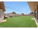 Expansive backyard with lush green lawn, perfect for outdoor activities and entertaining at 12627 N 25Th Ave, Phoenix, AZ 85029
