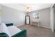 This cozy bedroom offers natural light, a desk, and plenty of open space at 12627 N 25Th Ave, Phoenix, AZ 85029