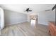 Living room featuring hardwood floors, ceiling fan and modern paint at 12627 N 25Th Ave, Phoenix, AZ 85029