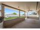 Covered patio offers a relaxing outdoor space with views of the landscaped backyard at 12627 N 25Th Ave, Phoenix, AZ 85029