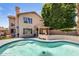 Private backyard with a refreshing pool, patio, and lush landscaping, perfect for relaxation at 1310 E Helena Dr, Phoenix, AZ 85022