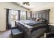 Comfortable bedroom featuring a large window for natural light and carpeted floors at 1310 E Helena Dr, Phoenix, AZ 85022