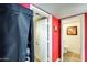 Hallway with adjacent bathroom, storage and neutral color palette at 1310 E Helena Dr, Phoenix, AZ 85022