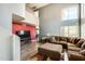 Open living room with high ceilings, modern decor, a large window, and ample seating at 1310 E Helena Dr, Phoenix, AZ 85022