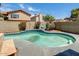 Backyard featuring a fenced in pool, mature plants, and ample space for outdoor enjoyment at 1310 E Helena Dr, Phoenix, AZ 85022
