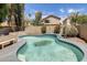 Backyard featuring a fenced in pool and mature landscaping, creating a private outdoor oasis at 1310 E Helena Dr, Phoenix, AZ 85022