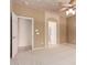 A spacious bedroom with plush carpeting provides ample room for relaxation and personalization at 13213 W Jacobson Dr, Litchfield Park, AZ 85340