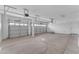 Spacious three car garage with high ceilings, bright lighting and ample storage space at 13304 W Palo Verde Dr, Litchfield Park, AZ 85340