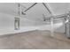 Spacious garage with ample storage and lighting for convenience at 13304 W Palo Verde Dr, Litchfield Park, AZ 85340