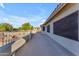 Spacious patio with railing and view of neighborhood at 13304 W Palo Verde Dr, Litchfield Park, AZ 85340