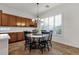 Cozy breakfast nook with lots of natural light and a simple chandelier at 1356 E Flamingo Ct, Gilbert, AZ 85297