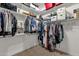 Organized walk-in closet featuring ample shelving and hanging space, perfect for storage and wardrobe at 1356 E Flamingo Ct, Gilbert, AZ 85297