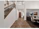 Grand foyer featuring soaring ceilings, staircase, tile flooring, and a view into the formal dining at 1356 E Flamingo Ct, Gilbert, AZ 85297