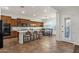 Spacious kitchen with a center island, bar seating, and bright natural light at 1356 E Flamingo Ct, Gilbert, AZ 85297