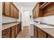 Spacious laundry room with washer, dryer, lots of counterspace, and cabinets at 1356 E Flamingo Ct, Gilbert, AZ 85297