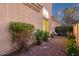 Secluded side yard with lush greenery, shrubs, and shade trees, offering a private retreat and serene outdoor space at 1356 E Flamingo Ct, Gilbert, AZ 85297
