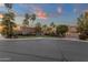 Charming neighborhood street featuring well-maintained homes, mature palm trees, and lush landscaping at 1356 E Flamingo Ct, Gilbert, AZ 85297