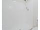 Bathroom with white tiled shower, toilet and neutral colors throughout at 14234 N 26Th Ln, Phoenix, AZ 85023