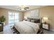 Comfortable bedroom with sliding glass door to patio, neutral tones, and plush carpeting at 14234 N 26Th Ln, Phoenix, AZ 85023