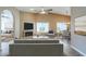 Inviting living area with a cozy fireplace, a dining area, and stylish decor that welcomes conversation at 14234 N 26Th Ln Ln, Phoenix, AZ 85023